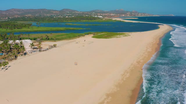 SAN JOSE DEL CABO MEXICO-2020: Sandy Beach with Lagoon and Ocean Waves