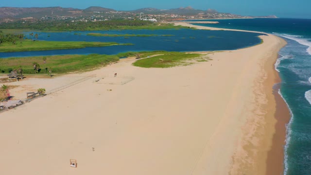 SAN JOSE DEL CABO MEXICO-2020: Sandy Beach with Lagoon and Ocean Waves