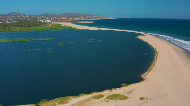 SAN JOSE DEL CABO MEXICO-2020: Lagoon and Sandy Beach with Ocean Adjacent