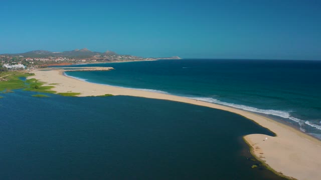 SAN JOSE DEL CABO MEXICO-2020: Sandy Beach Spit Curving Between Lagoon and Ocean