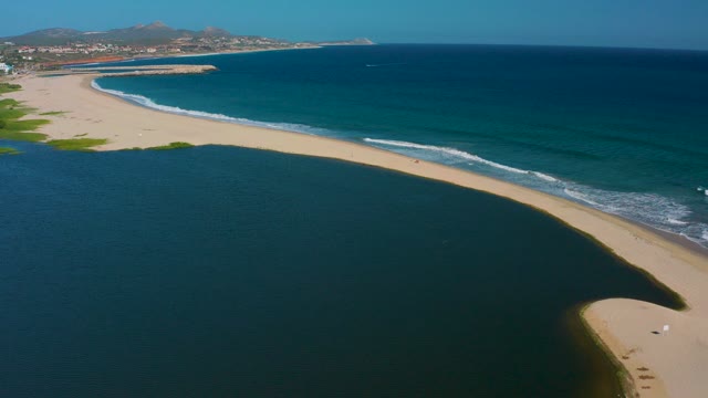 SAN JOSE DEL CABO MEXICO-2020: Sandy Beach with Lagoon and Ocean Waves