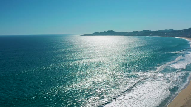 SAN JOSE DEL CABO MEXICO-2020: Waves Rolling In On Sandy Shore