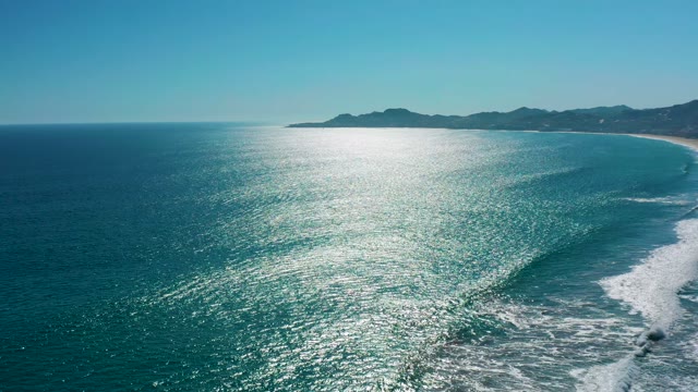 SAN JOSE DEL CABO MEXICO-2020: Ocean Wave Breaking Toward Sandy Shore