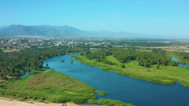SAN JOSE DEL CABO MEXICO-2020: River Meandering Through Lush Green Valley