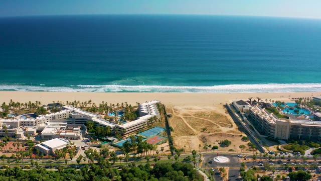 SAN JOSE DEL CABO MEXICO-2020: Beachfront Resort Area with Ocean and Palm Trees