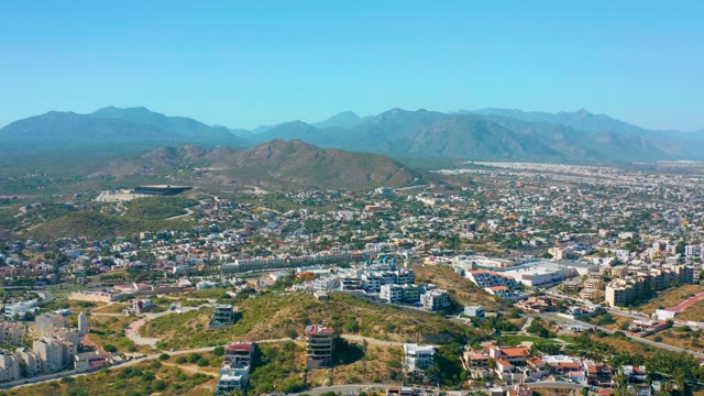 SAN JOSE DEL CABO MEXICO-2020: Cityscape with Hills and Distant Mountains