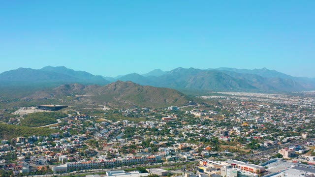 SAN JOSE DEL CABO MEXICO-2020: Slow Pan of Urban Area and Mountain Range