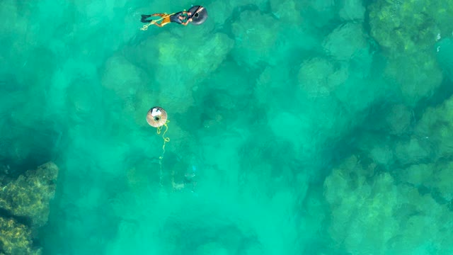 SAN JOSE DEL CABO BCS MEXICO-2020: Swimmers and Float in Clear Turquoise Water