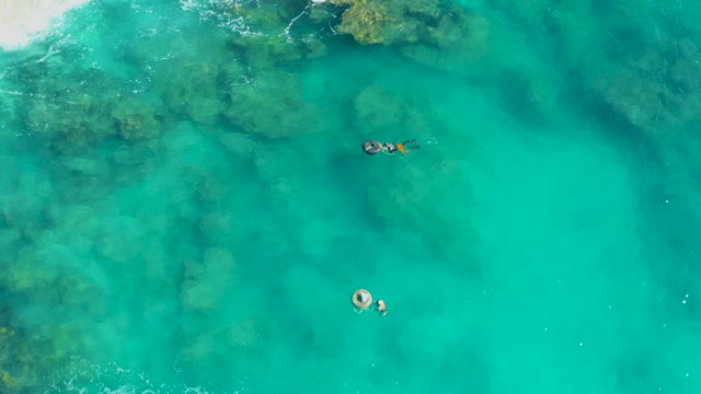 SAN JOSE DEL CABO BCS MEXICO-2020: People Swimming in Clear Turquoise Water