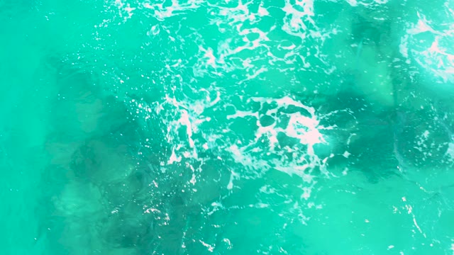 SAN JOSE DEL CABO BCS MEXICO-2020: Shifting White Foam on Clear Turquoise Water