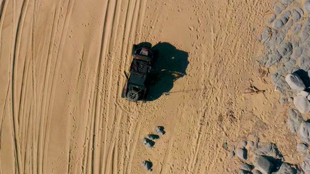 SAN JOSE DEL CABO BCS MEXICO-2020: Black Jeep Navigating Sandy Desert