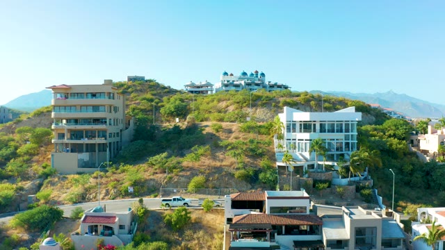 SAN JOSE DEL CABO BCS MEXICO-2020: Hillside Residential Area with Modern Buildings and Road