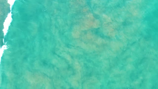 SAN JOSE DEL CABO BCS MEXICO-2020: Shifting Foam on Clear Turquoise Water Surface