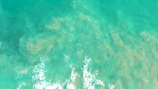 SAN JOSE DEL CABO BCS MEXICO-2020: Gentle Waves Breaking Over Shallow Turquoise Ocean