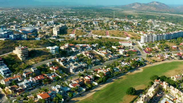 SAN JOSE DEL CABO BCS MEXICO-2020: Aerial View of Suburban Homes and Green Field