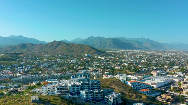 SAN JOSE DEL CABO BCS MEXICO-2020: Cityscape Pan with Mountain Backdrop