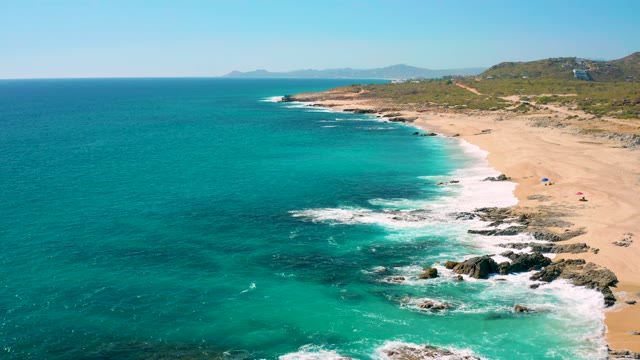 EAST CAPE BCS MEXICO-2020: Waves Crashing on Rocky Shore with Sandy Beach