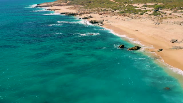 EAST CAPE BCS MEXICO-2020: Turquoise Ocean Waves Lapping Sandy Shore