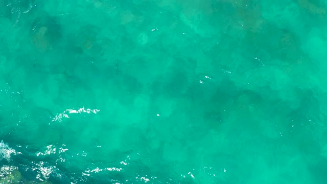 EAST CAPE BCS MEXICO-2020: Clear Turquoise Ocean Water with Submerged Rocks and Gentle Waves