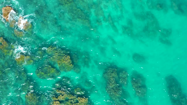 EAST CAPE BCS MEXICO-2020: Ocean Waves Breaking over Submerged Rocks in Clear Water