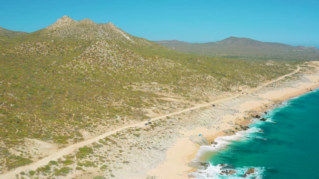 EAST CAPE BCS MEXICO-2020: Sandy Beach and Coastal Road with Moving Ocean Waves