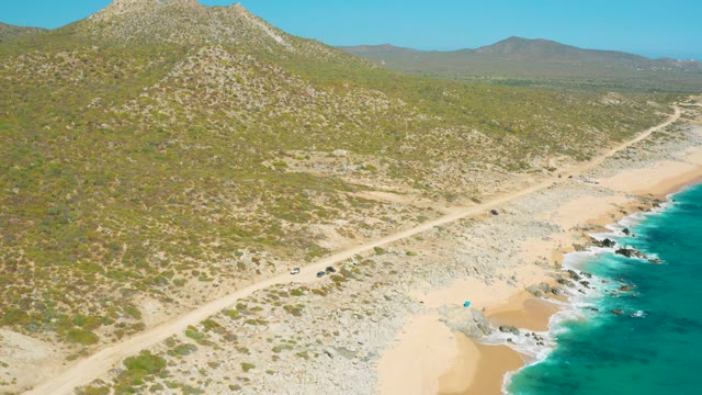 EAST CAPE BCS MEXICO-2020: Coastal Road Beside Sandy Beach and Mountains