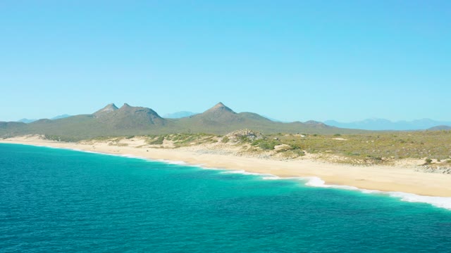 EAST CAPE BCS MEXICO-2020: Gentle Ocean Waves Rolling Onto Sandy Shore