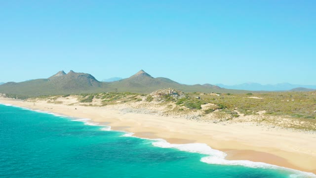 EAST CAPE BCS MEXICO-2020: Sandy Shore and Turquoise Ocean Waves by Mountain Range