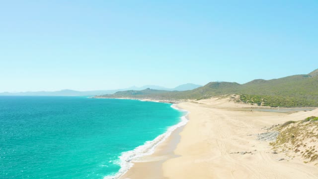 EAST CAPE BCS MEXICO-2020: Ocean Waves Rolling Onto Sandy Shore