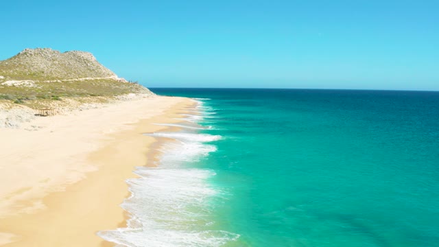 EAST CAPE BCS MEXICO-2020: Waves Rolling Onto a Sandy Beach