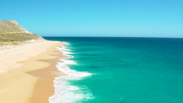 EAST CAPE BCS MEXICO-2020: Waves Rolling Onto Sandy Shore From Aerial View