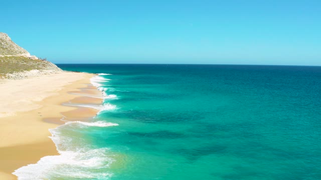 EAST CAPE BCS MEXICO-2020: Gentle Waves Rolling Onto Sandy Beach