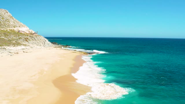 EAST CAPE BCS MEXICO-2020: Wave Approaching Sandy Shore with Turquoise Ocean