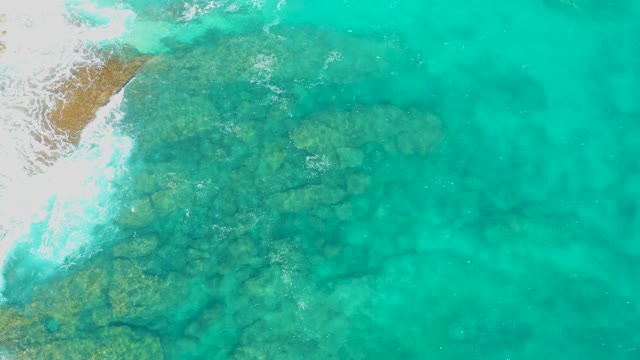 Gentle Waves Lapping at Sandy Shoreline