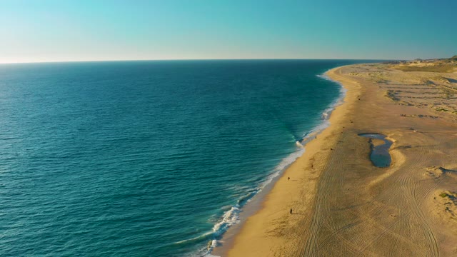 Gentle Ocean Waves Lapping Sandy Beach