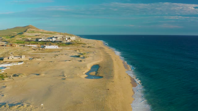 Sandy Beach and Ocean Waves From Above