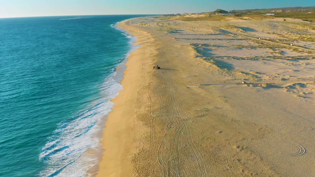 Ocean Waves Gently Reaching the Sandy Shore