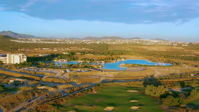 Golf Course with Blue Water and Dry Landscape