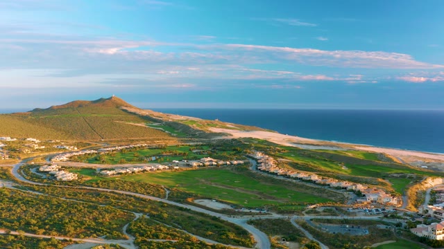 Coastal Hillside with Winding Roads and Buildings