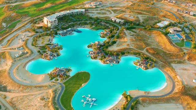 Large Blue Lake in Developing Arid Landscape