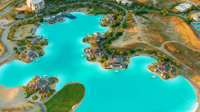 Large Blue Lake with House Islands From Above