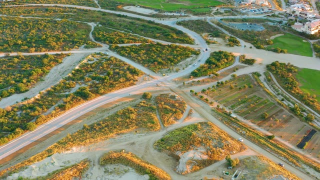 Vehicles Moving Through a New Road Intersection