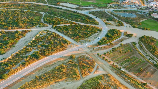 Vehicles Moving at Road Junction Aerial