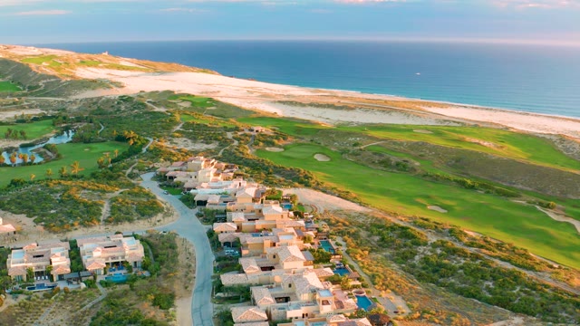 Coastal Residential Area with Golf Course and Sandy Beach