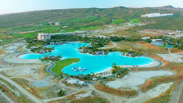 Pool Filling with Water in Hilly Landscape
