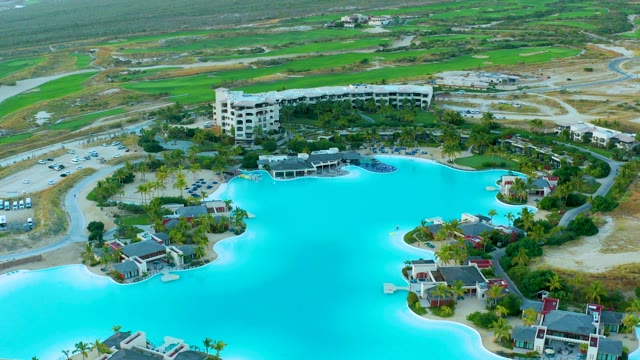 DIAMANTE CABO SAN LUCAS BCS MEXICO-2020: Resort Lagoon and Parking Lot with Moving Vehicles
