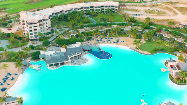 DIAMANTE CABO SAN LUCAS BCS MEXICO-2020: Aerial Pan of Resort Pool and Lush Surroundings