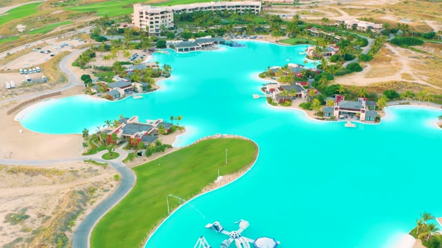 DIAMANTE CABO SAN LUCAS BCS MEXICO-2020: Lagoon with Buildings and Approaching Boat