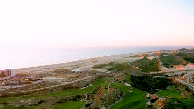 DIAMANTE CABO SAN LUCAS BCS MEXICO-2020: Coastal Sunset Over Ocean and Developed Shoreline