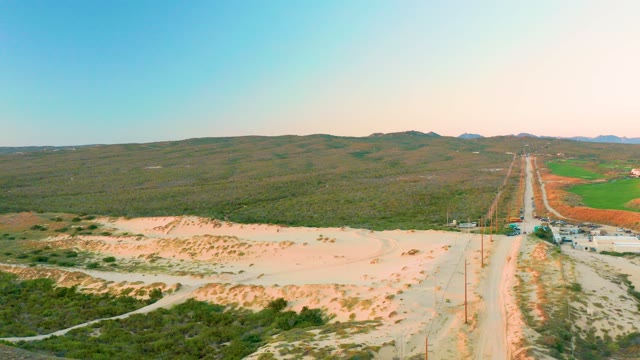 DIAMANTE CABO SAN LUCAS BCS MEXICO-2020: Aerial Descent Over Rural Road and Arid Landscape